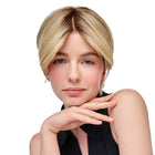 Woman wearing a 6in Au Naturel Topper in Rooted Medium Blonde Balayage