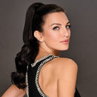 Woman wearing a 21in Soft Curls Claw Clip Pony in Midnight Brown - Right side profile view