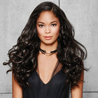 Woman wearing 22in 4-pc Wavy Fineline Extension Kit in Midnight Brown