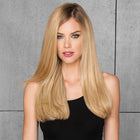 Woman wearing a 20in 10 piece human hair extension in Ginger Blonde