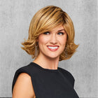 Woman wearing an Allure Wig in Ginger Blonde - View from the front