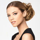 Woman wearing Modern Chignon hairpiece in Buttered Toast