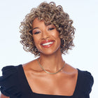 Woman wearing Relaxed Coils Wig in Glazed Mocha - View from the front
