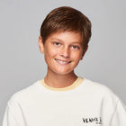 Young boy wearing Super Mane Childrens Wig in Chestnut - View from the front